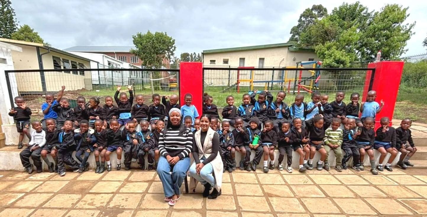 Learners with their teachers outside the classrooms